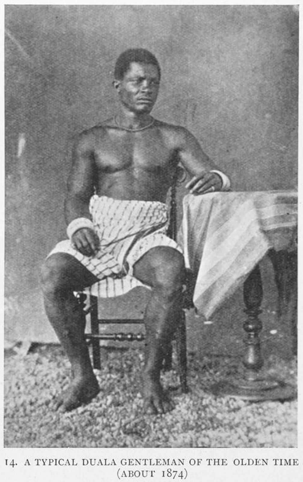 A typical Duala gentlemen of the olden time [about 1874], Shark Dido, Dido Town, Cameroons, son of the Chief Dido herein referreed to.